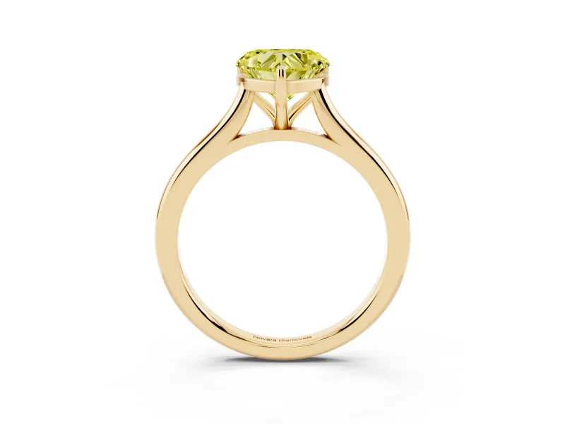 Fancy Yellow Heart Cut Diamond Solitaire Ring Set in Yellow gold with Cathedral Band and Prong Setting