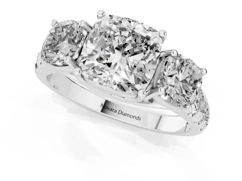 Cushion Cut Diamond Three-Stone Ring Set in White gold with Pavé Band