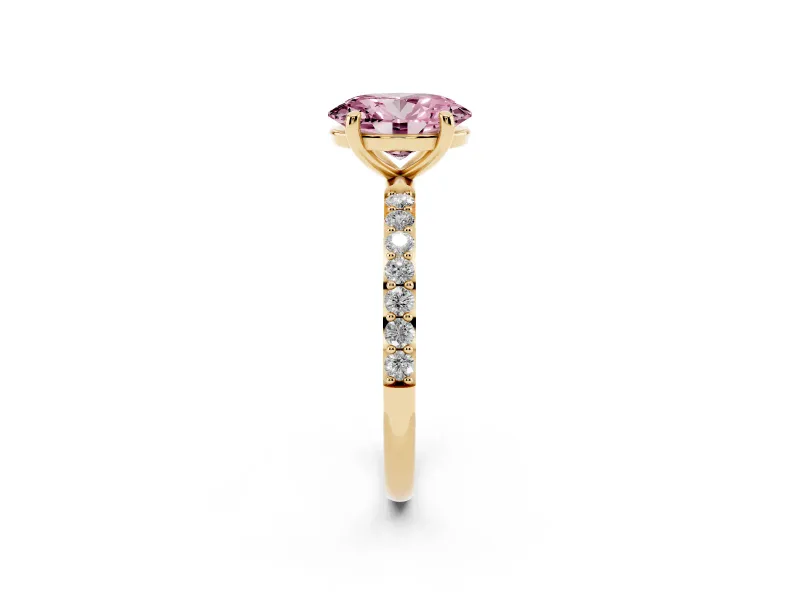 Fancy Pink Oval Cut Diamond Solitaire Ring Set in Yellow gold with Round Pavé Band and Prong Setting