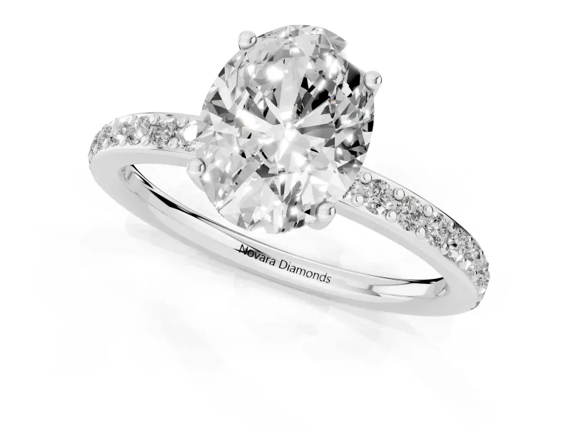 Oval Cut Diamond Pavé Band Ring Set in Platinum with Prong-Set Center Stone
