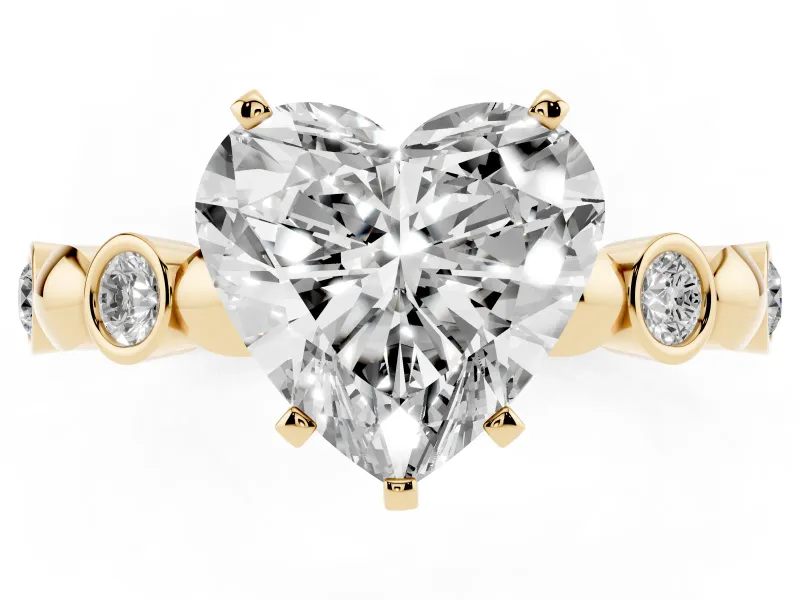 Heart Cut Diamond Solitaire Ring Set in Yellow gold with Bezel-Set Accents on Beaded Band and Prong Setting