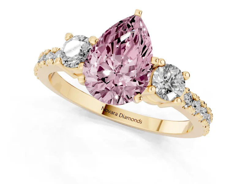 Pear-Shaped Three Stone Engagement Ring Setting for a Fancy Pink Lab-Grown Diamond | Pavé Band | Yellow Gold