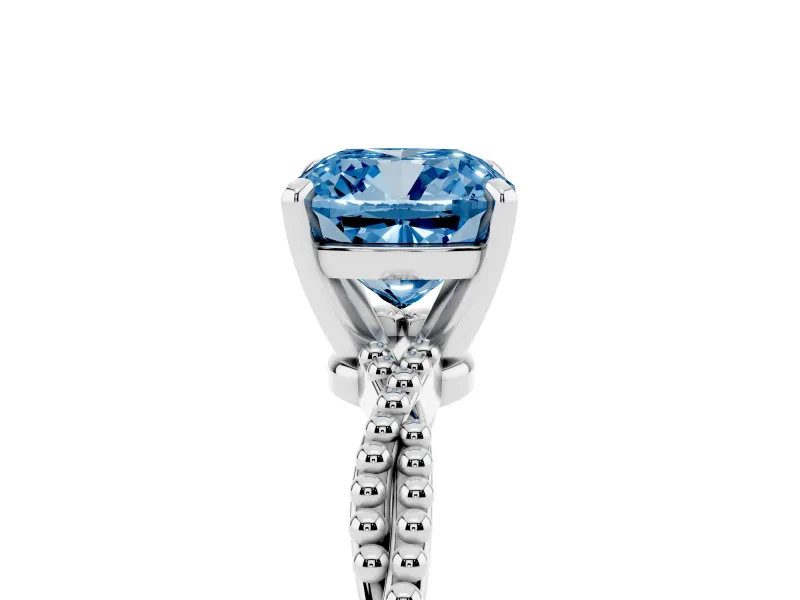 Fancy Blue Cushion Cut Diamond Solitaire Ring Set in White gold with Twisted Band and Bead Prong Setting