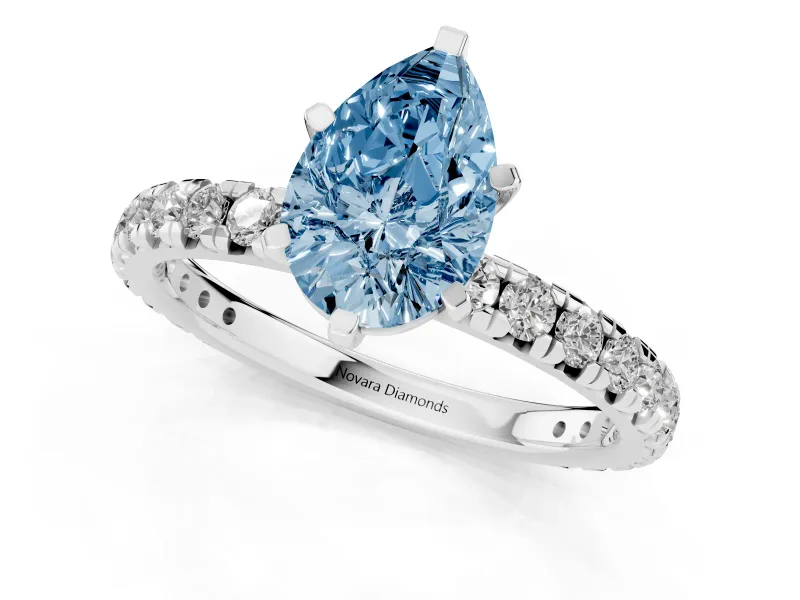 Fancy Blue Pear Cut Diamond Pavé Solitaire Ring Set in Silver with Round Band and Prong Setting