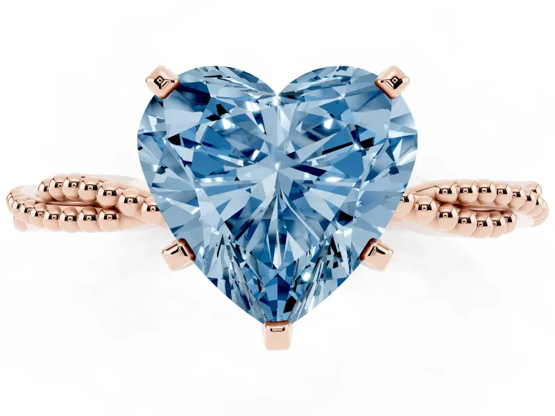Fancy Blue Heart Cut Diamond Solitaire Ring Set in Rose gold with Twisted Band and Bead Prong Setting