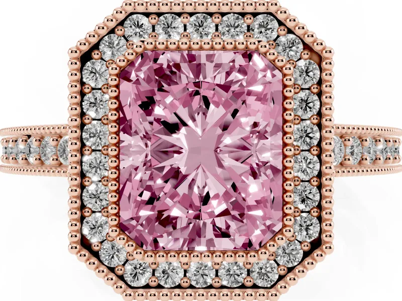 Fancy Pink Radiant Cut Diamond Halo Engagement Ring Set in Rose gold with Pavé Band and Round Halo Stones