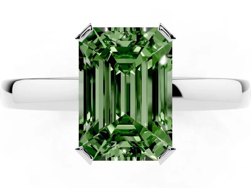 Fancy Green Emerald Cut Diamond Solitaire Ring Set in White gold with Prong Head and Smooth Polished Band