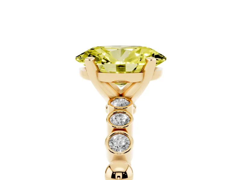 Fancy Yellow Oval Cut Diamond Solitaire Engagement Ring Set in Yellow gold with Bezel Accents on Beaded Band