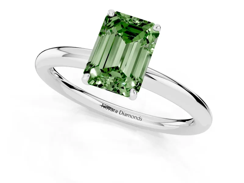 Fancy Green Emerald Cut Diamond Solitaire Ring Set in Silver with Prong Setting on a Polished Plain Band