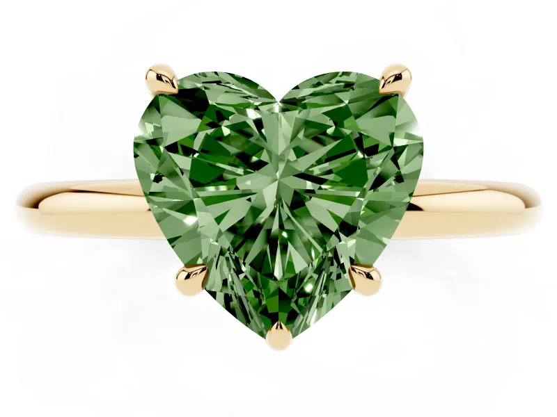 Fancy Green Heart Cut Diamond Solitaire Ring Set in Yellow gold with Thin Band and Prong Setting