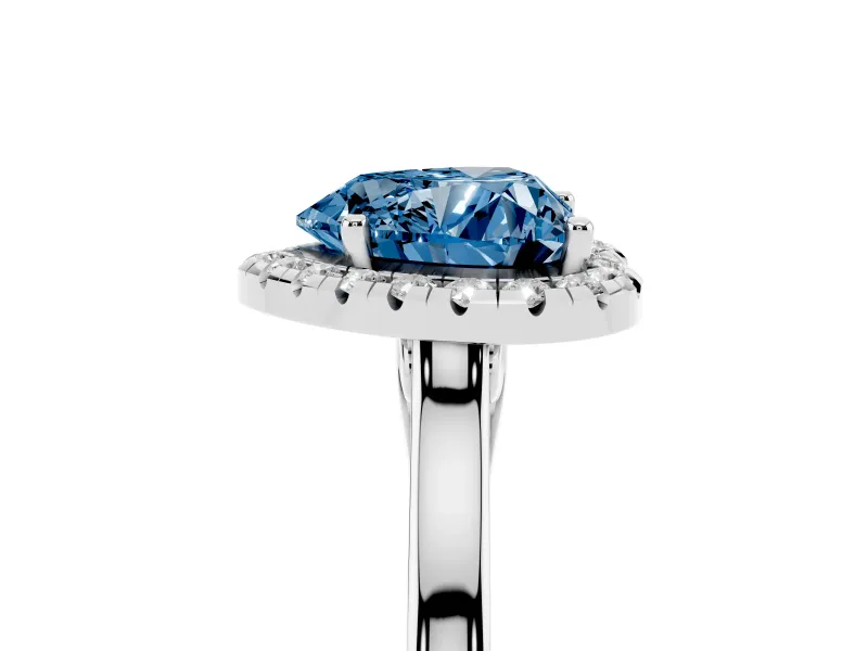Fancy Blue Heart Cut Halo Round Diamond Solitaire Ring Set in Platinum with Pavé Band and Prong Setting