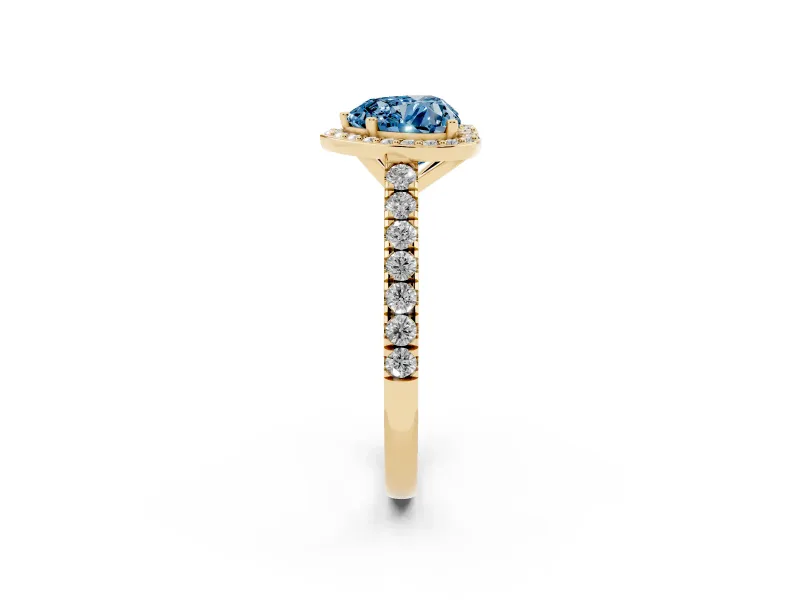 Fancy Blue Heart Cut Diamond Halo Engagement Ring Set in Yellow gold with Pavé Band and Prong Setting