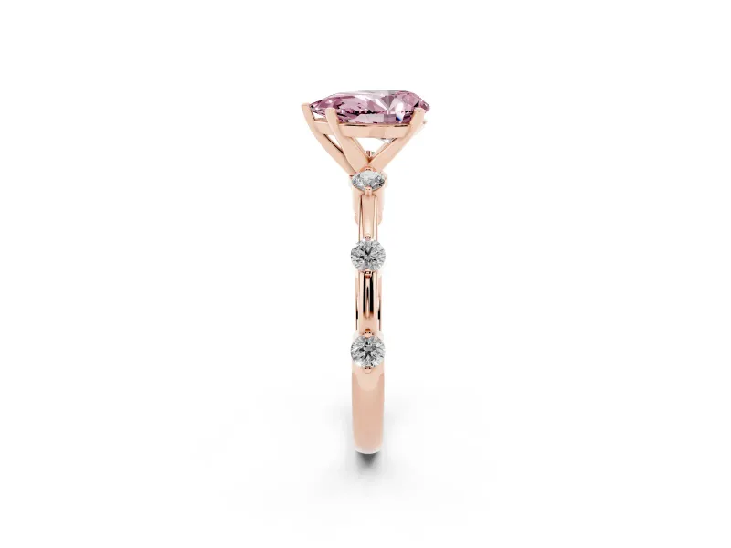 Fancy Pink Pear Cut Diamond Solitaire Ring Set in Rose gold with Bezel Set Side Stones and Prong Setting