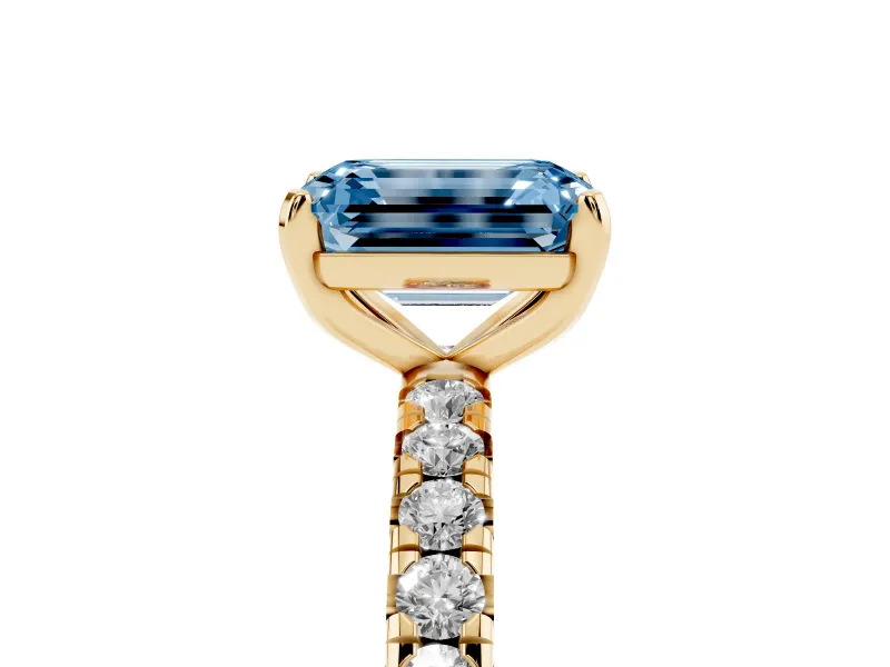 Fancy Blue Emerald Cut Diamond Pavé Solitaire Ring Set in Yellow gold with Round Band and Prong Setting