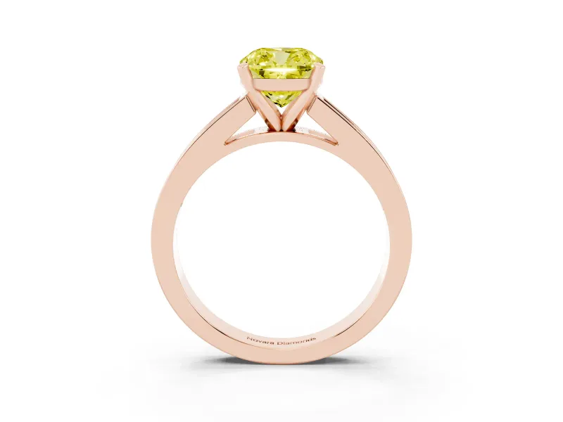 Fancy Yellow Cushion Cut Diamond Solitaire Ring Set in Rose gold with Channel-Set Band and Prong Setting