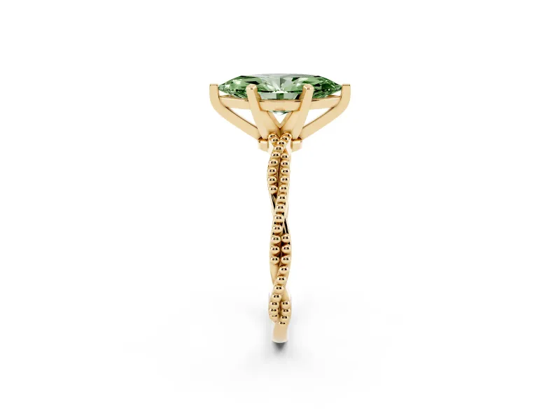 Fancy Green Marquise Cut Diamond Solitaire Ring Set in Yellow gold with Twisted Band and Bead Prong Setting
