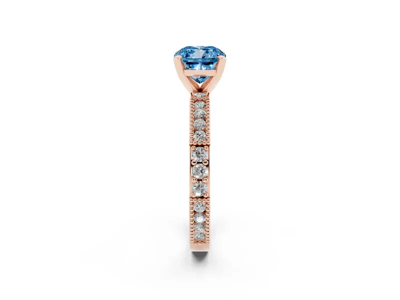 Fancy Blue Cushion Cut Diamond Solitaire Ring Set in Rose gold with Slim Pavé Band and Prong Setting