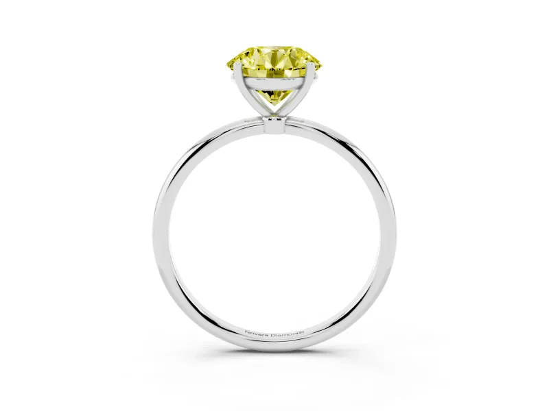 Fancy Yellow Round Cut Diamond Solitaire Engagement Ring Set in Silver with Thin Band and Prong Setting