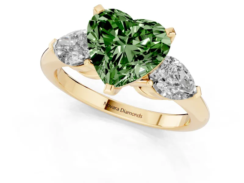 Fancy Green Three-Stone Heart Cut Diamond Ring Set in Yellow gold with Pear Side Stones and Prong Setting