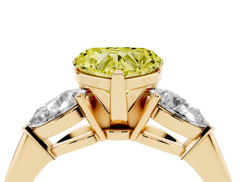 Fancy Yellow Three-Stone Heart Cut Diamond Ring Set in Yellow gold with Pear Side Stones and Prong Setting