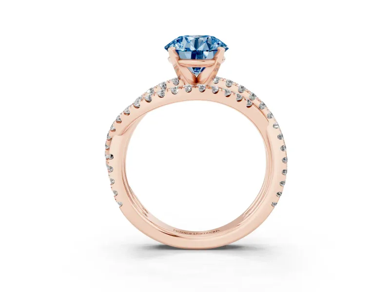 Fancy Blue Round Cut Diamond Solitaire Twist Band Ring Set in Rose gold with Pavé Setting and Prong Head