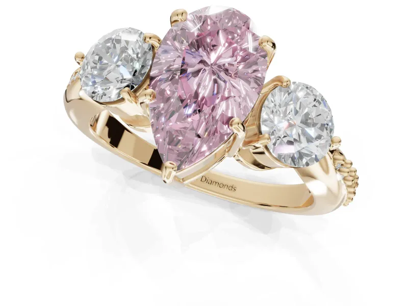 Pear-Shaped Three Stone Engagement Ring Setting for a Fancy Pink Lab-Grown Diamond | Tapered Pave Band | Yellow Gold