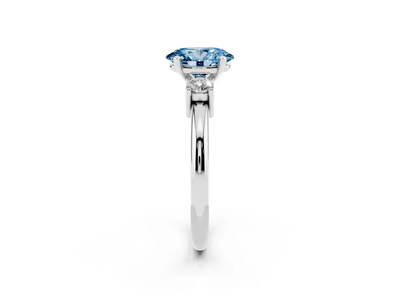 Fancy Blue Three-Stone Oval Cut Diamond Ring Set in White gold with Prong Setting and Plain Band