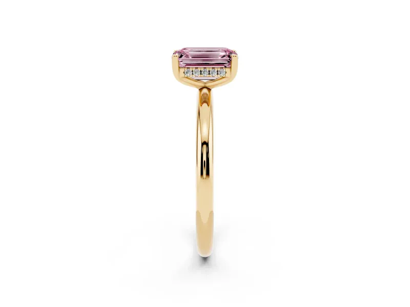 Fancy Pink Emerald Cut Diamond Solitaire Engagement Ring Set in Yellow gold with Prong Setting and Polished Band