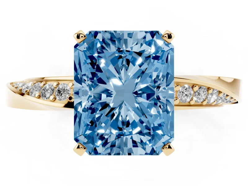 Fancy Blue Radiant Cut Diamond Engagement Ring Set in Yellow gold with Side Stone Accents and Prong Setting