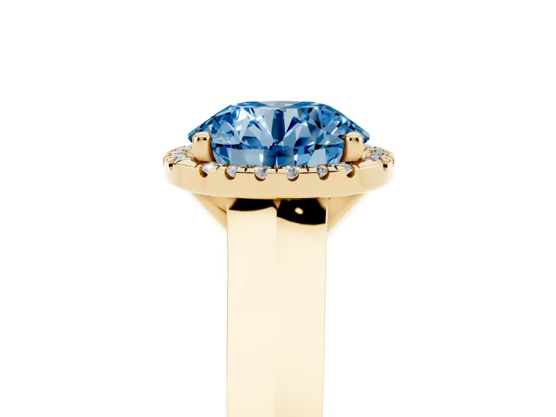 Fancy Blue Round Cut Diamond Halo Ring Set in Yellow gold with Cathedral Band and Prong Setting