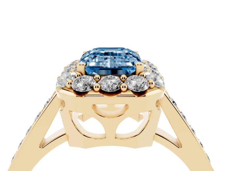 Fancy Blue Emerald Cut Diamond Floral Halo Ring Set in Yellow gold with Pavé Band and Prong Setting