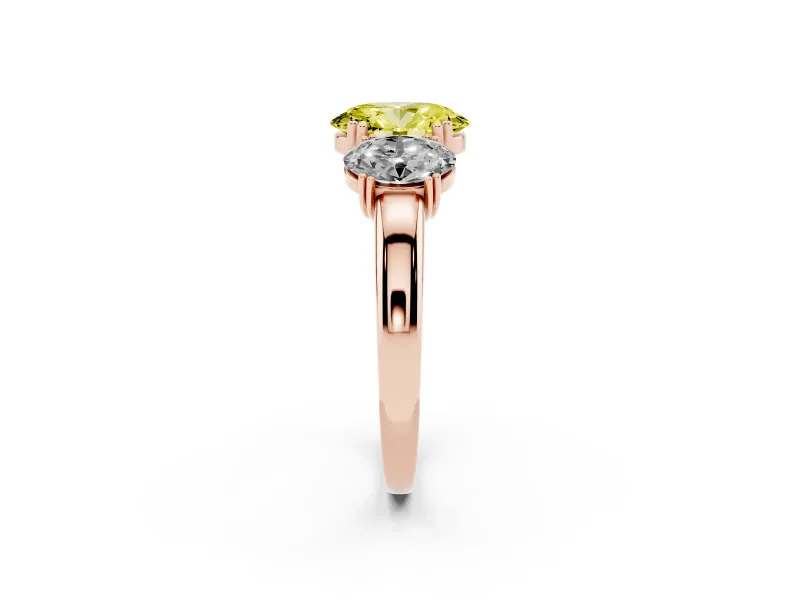 Fancy Yellow Oval Cut Diamond Three-Stone Ring Set in Rose gold with Polished Band and Prong Setting