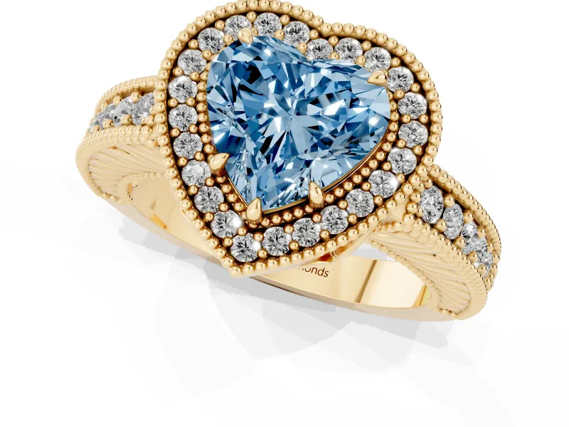Fancy Blue Heart Cut Diamond Halo Ring Set in Yellow gold with Round Accent Halo, Pavé Band and Prong Setting