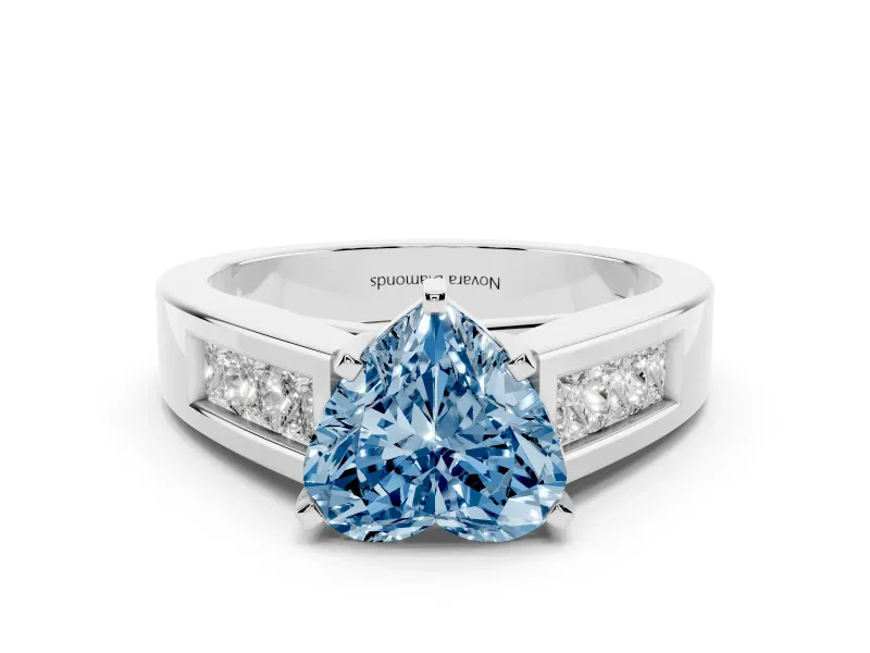 Fancy Blue Heart Cut Diamond Solitaire Ring Set in White gold with Channel-Set Accent Stones and Prong Setting