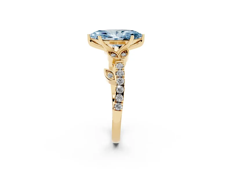 Fancy Blue Marquise Cut Diamond Solitaire Leaf-Inspired Ring Set in Yellow gold with Pavé Band and Prong Setting