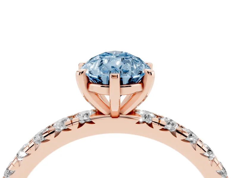 Fancy Blue Pear Cut Diamond Pavé Solitaire Ring Set in Rose gold with Round Band and Prong Setting