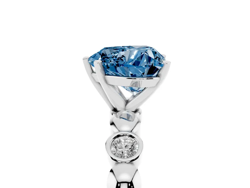 Fancy Blue Heart Cut Diamond Solitaire Ring Set in Silver with Bezel-Set Accents on Beaded Band and Prong Setting