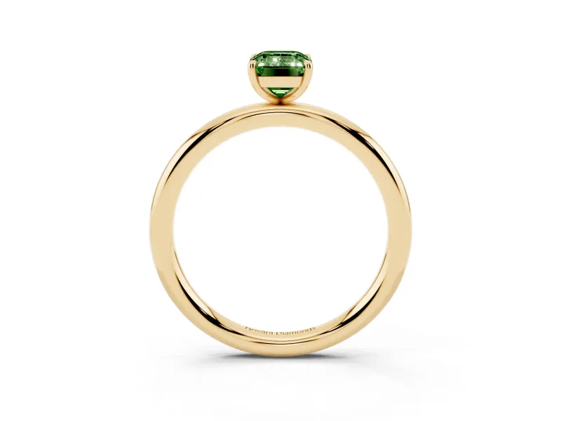Fancy Green Emerald Cut Diamond Solitaire Ring Set in Yellow gold with Prong Setting on a Polished Plain Band