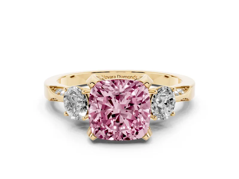 Fancy Pink Cushion Cut Diamond Three-Stone Ring Set in Yellow gold with Pavé Band and Smaller Side Stones