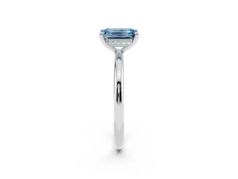 Fancy Blue Emerald Cut Diamond Solitaire Ring Set in Silver with Thin Band and Prong Setting