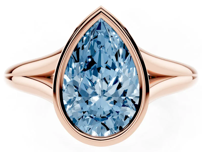 Fancy Blue Bezel Set Pear Cut Diamond Solitaire Ring Set in Rose gold with Tapered Band