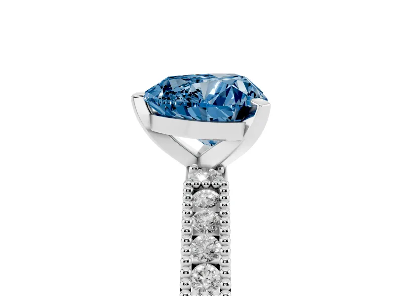Fancy Blue Heart Cut Diamond Solitaire Ring Set in White gold with Slim Pavé Band and Prong Setting