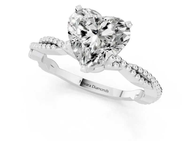 Heart Cut Diamond Solitaire Ring Set in Silver with Twisted Band and Bead Prong Setting