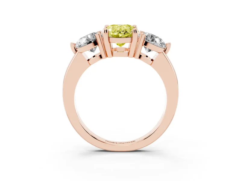 Fancy Yellow Oval Cut Diamond Three-Stone Ring Set in Rose gold with Prong Setting and Classic Band
