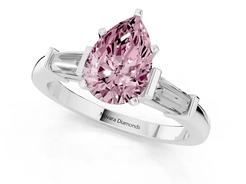 Fancy Pink Pear Cut Diamond Solitaire Ring Set in Silver with Tapered Baguette Accents and Prong Setting