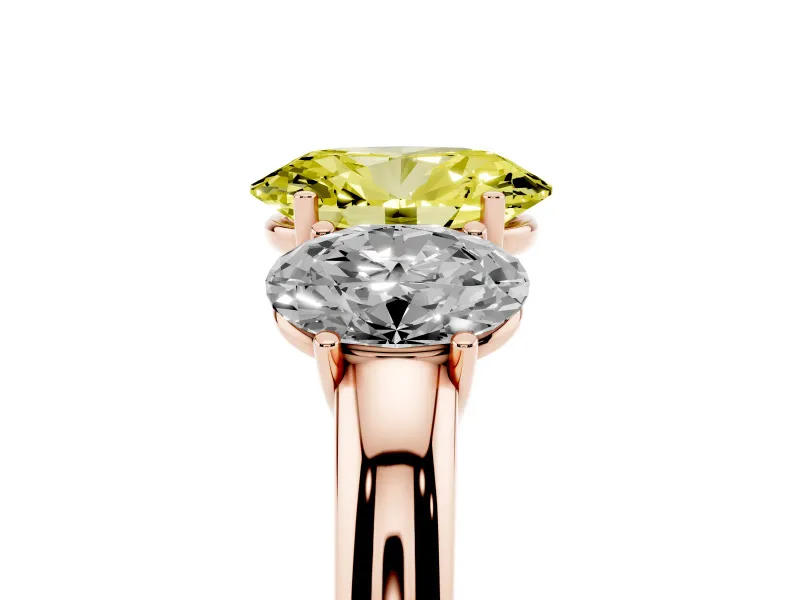 Fancy Yellow Oval Cut Diamond Three-Stone Ring Set in Rose gold with Bold Center and Classic Band