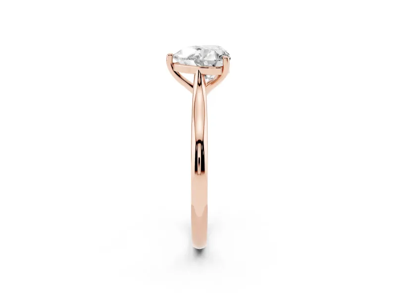 Heart Cut Diamond Solitaire Ring Set in Rose gold with Cathedral Band and Prong Setting