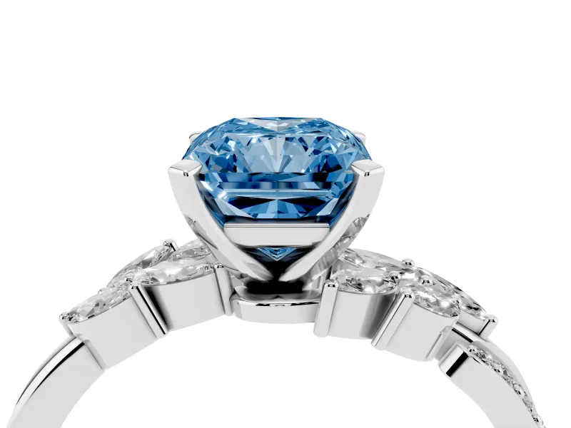 Fancy Blue Radiant Cut Diamond Solitaire Ring Set in White gold with Marquise Twist Band and Prong Setting