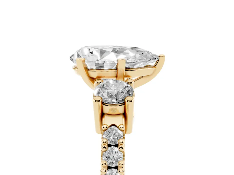 Pear-Shaped Three Stone Pavé Engagement Ring Setting | Round Side Stones | Yellow Gold