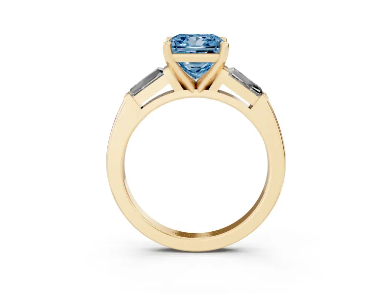 Fancy Blue Princess Cut Diamond Solitaire Ring Set in Yellow gold with Tapered Baguette Side Stones and Prong Setting